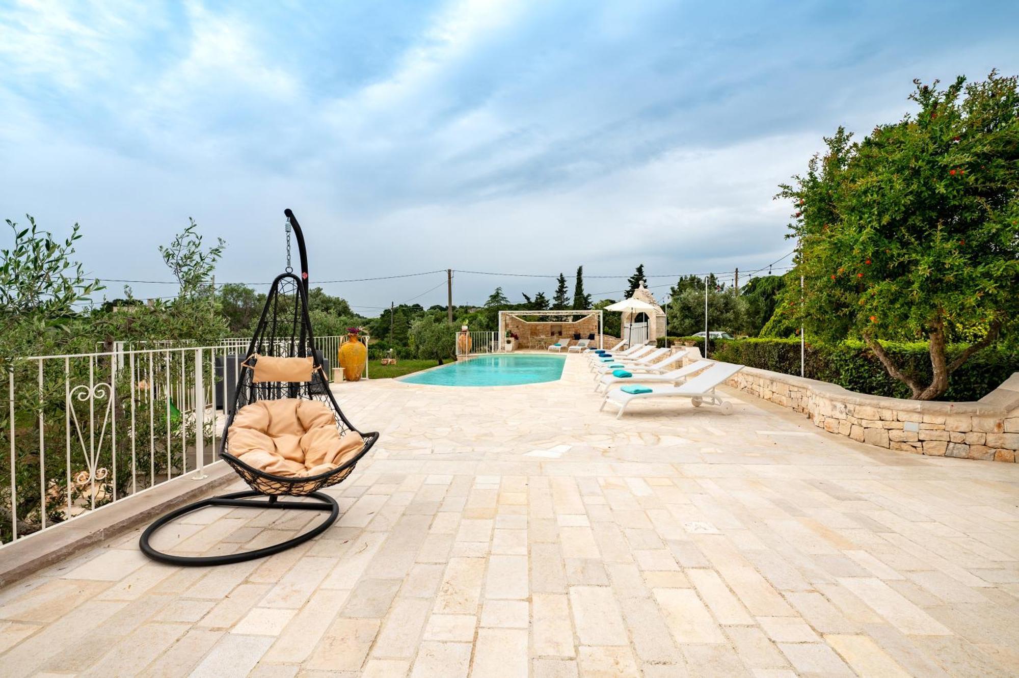 Trullo Degli Anelli In Masseria Cisternino Exterior photo